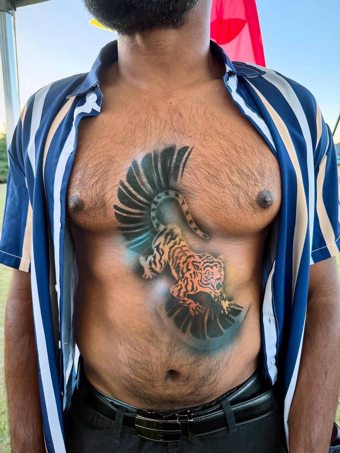 Professional airbrush tattoo designs at a corporate event in Central London