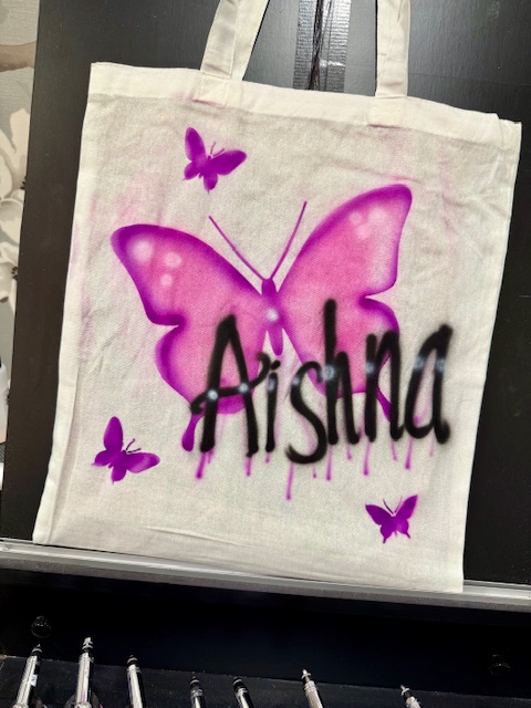 Bespoke stencil design for brand logo airbrush application at corporate event