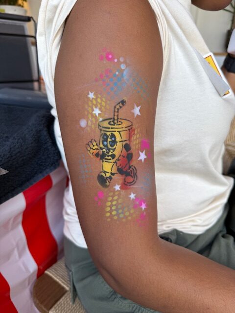 Customised Airbrush tattoos for a corporate event in London. 