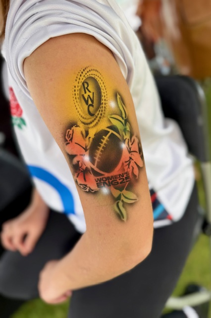 Airbrush tattoos with branded logos for corporate brand activation event